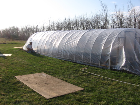 Covering the greenhouse. Note: If you can do this in warm weather, 